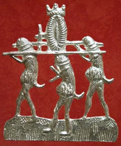 Three Phallus creatures carrying a crowned vulva badge